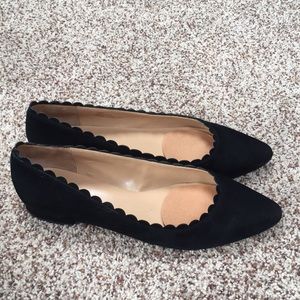 Scalloped edge black suede flat